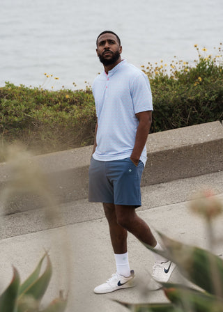 Cotton candy bladed collar polo, comfortable performance fabric for athletic leisure activities.