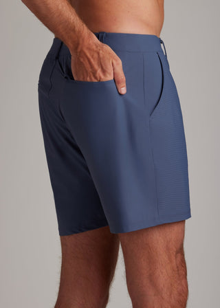 Indigo golf walk shorts for modern athletes, featuring lightweight, four-way stretch fabric.