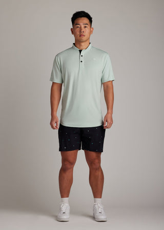 Green bladed collar polo shirt, crafted for style, performance, and comfort.