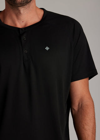 Black 3-button polo shirt crafted from breathable micro-mesh fabric for active sports.