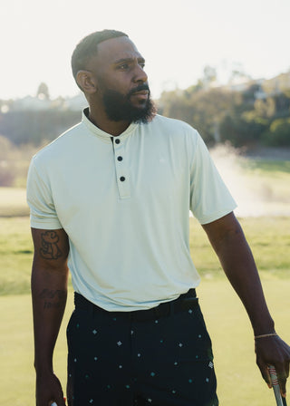 Green bladed collar polo shirt, crafted for style, performance, and comfort.