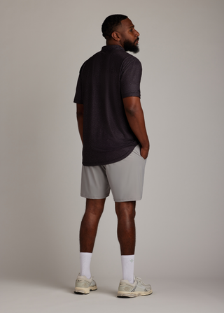 Light grey golf walk shorts crafted from ultra-lightweight, four-way stretch fabric.