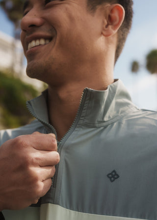 Athletic fit Taylor Day greens quarter zip windbreaker for everyday movement.