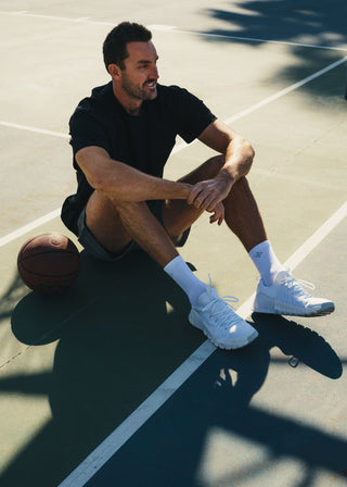 Black oversized tee made from soft, breathable fabric for everyday comfort.