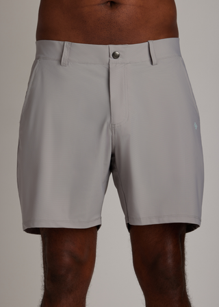 Light grey golf walk shorts crafted from ultra-lightweight, four-way stretch fabric.