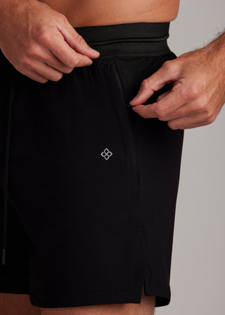 Black hyper-breathable active shorts with elasticated drawstring waistband, versatile for running and training.