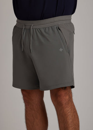 Gray hyper-breathable active shorts with zippered pockets, ideal for intense workouts.
