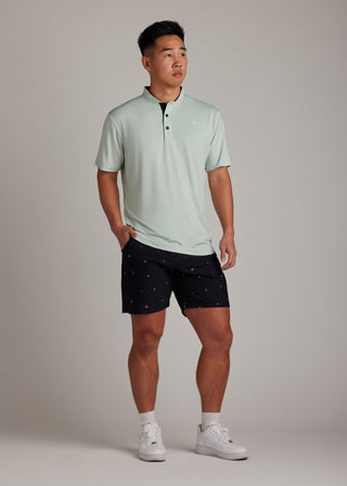 Green bladed collar polo shirt, crafted for style, performance, and comfort.
