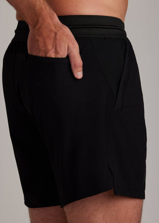 Black hyper-breathable active shorts with elastic drawstring waistband for running and training.
