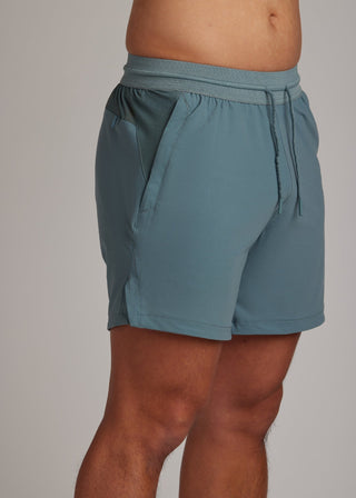 Midnight Emerald active shorts designed for running, training, and main-wear.