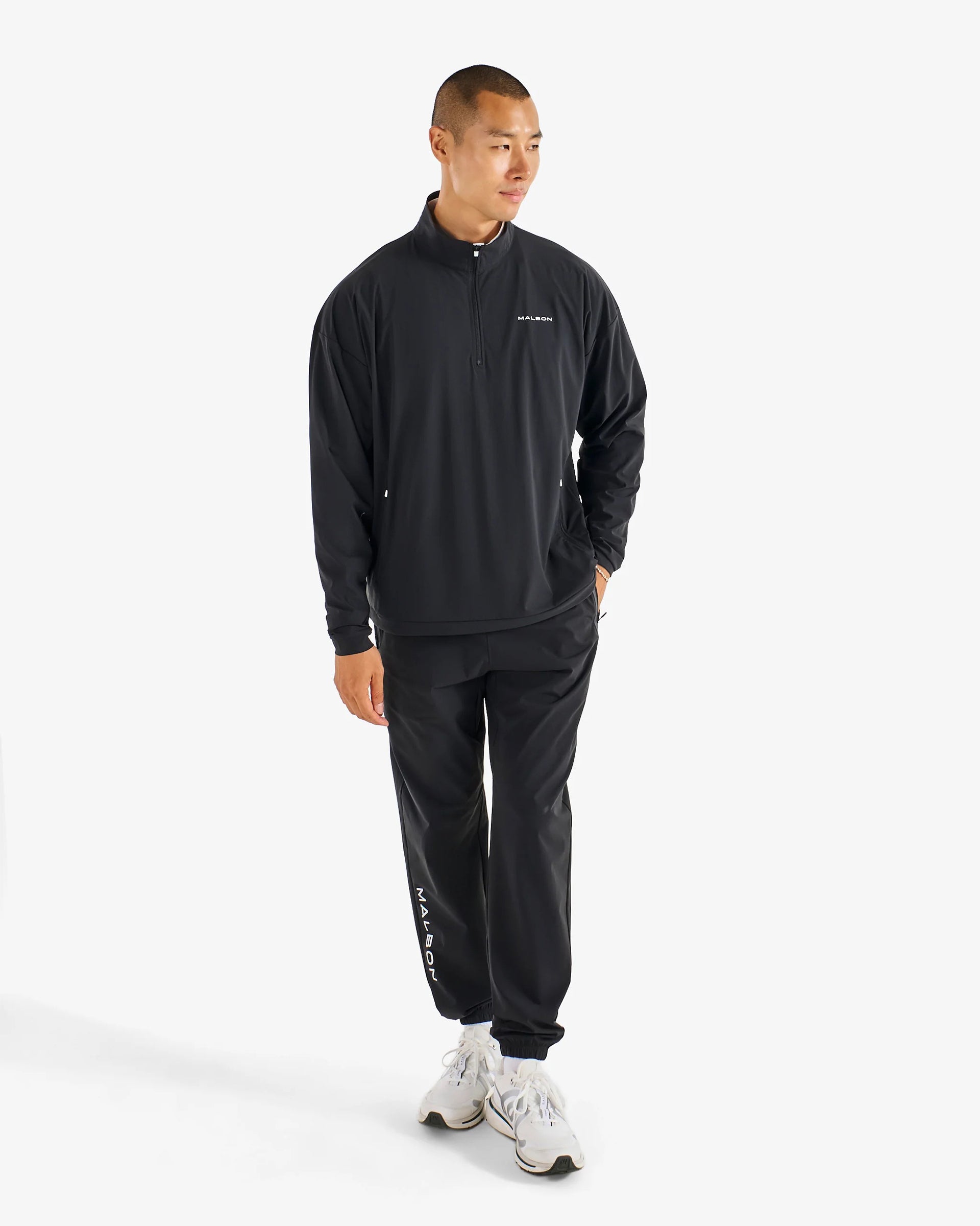 Malbon Performance Quarter Zip Shell Pullover - Black – Jack's