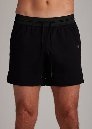 Black hyper-breathable active shorts with elastic drawstring waistband for running and training.