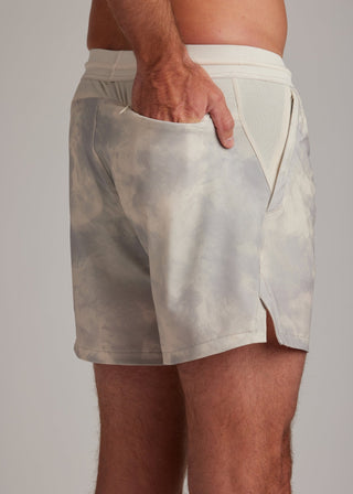Cream Smoke active shorts made from versatile fabric, perfect for training sessions.