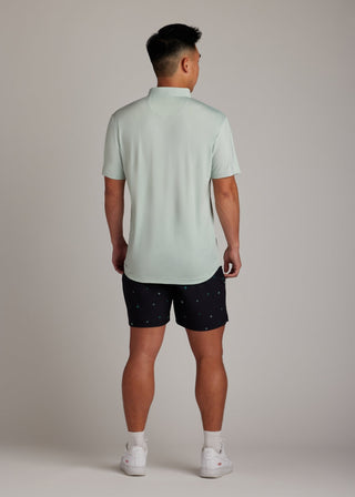 Green bladed collar polo shirt, crafted for style, performance, and comfort.
