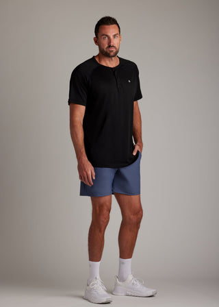 Black 3-button polo shirt crafted from breathable micro-mesh fabric for active sports.