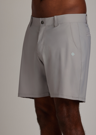 Light grey golf walk shorts crafted from ultra-lightweight, four-way stretch fabric.