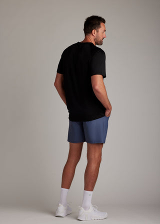 Black 3-button polo shirt crafted from breathable micro-mesh fabric for active sports.